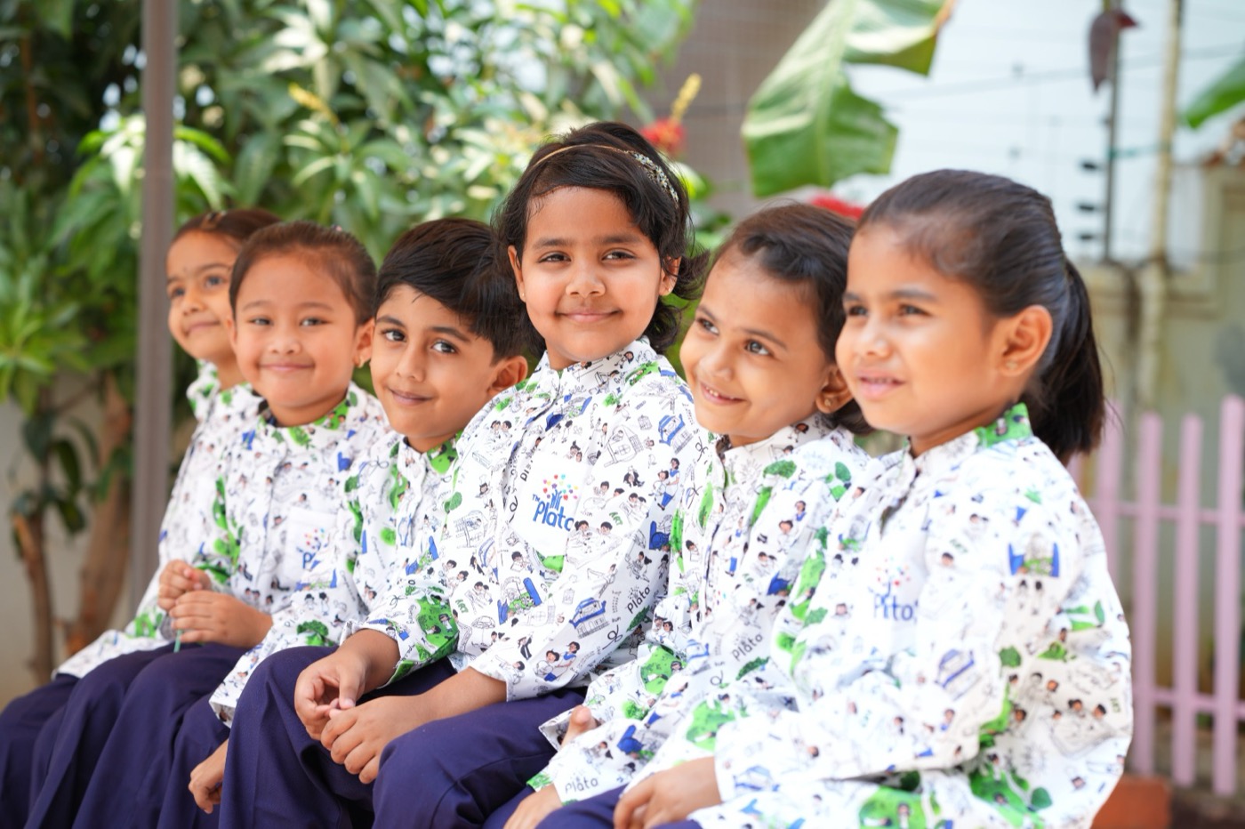 Group of children at The Platos in school uniform
